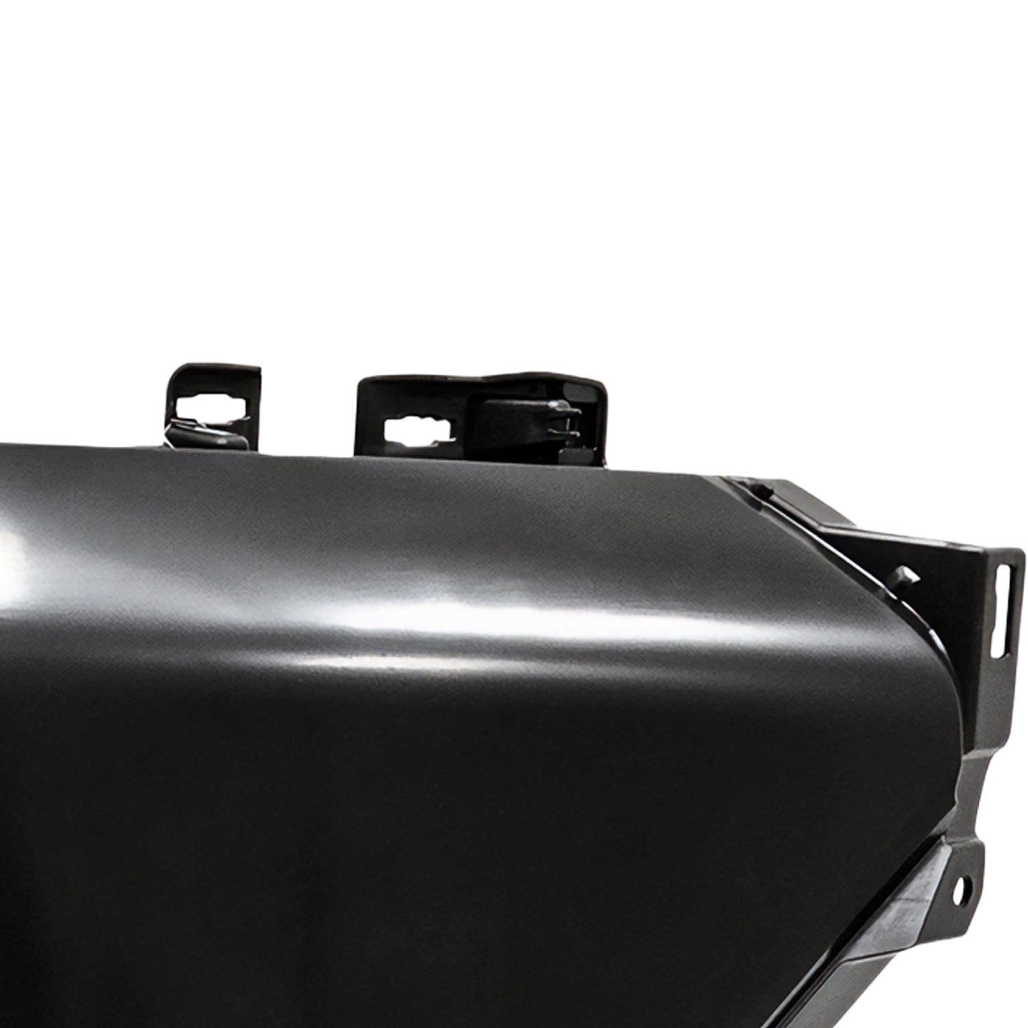 Close-up of painted Toyota 4Runner passenger-side bumper end replacement with sensor holes